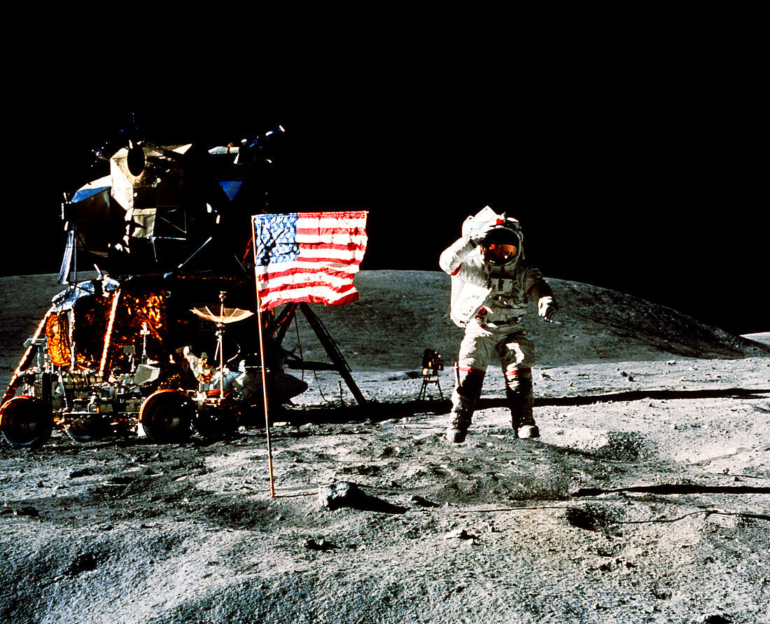 Astronaut saluting US flag on the Moon