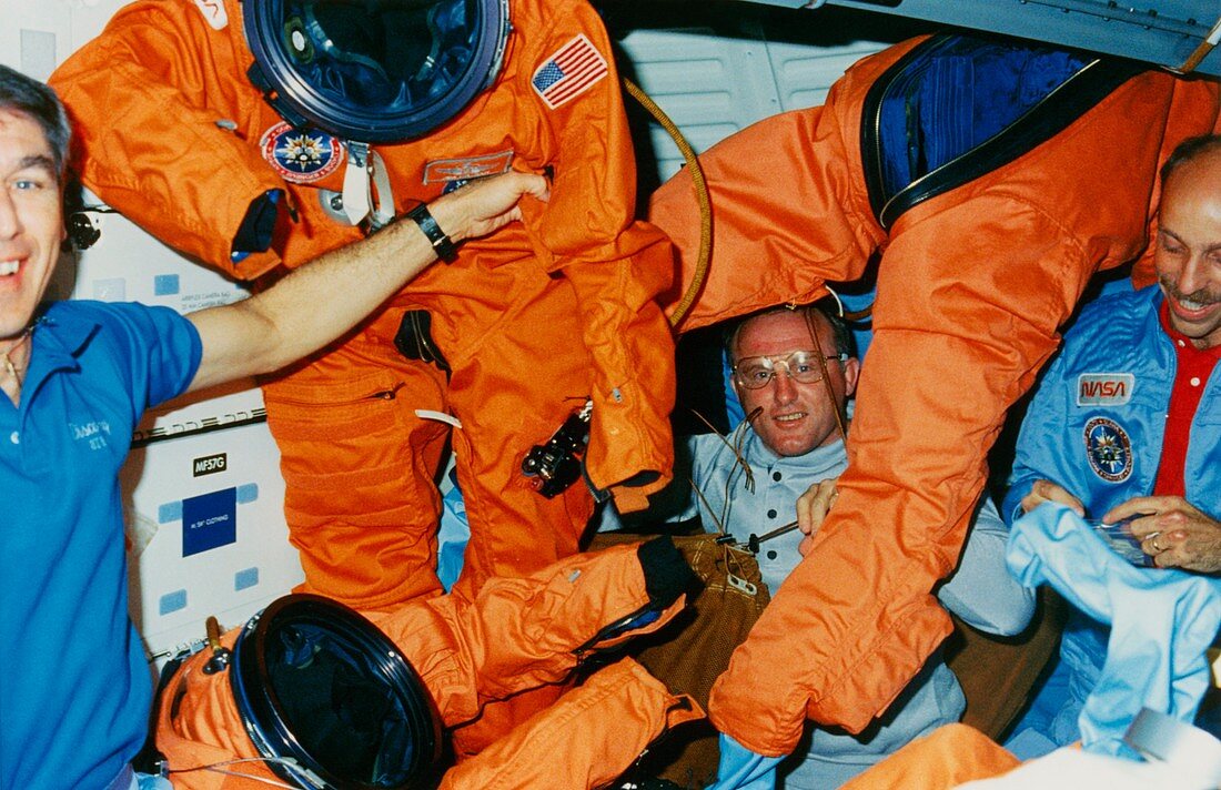 STS-29 astronauts in mid-deck area