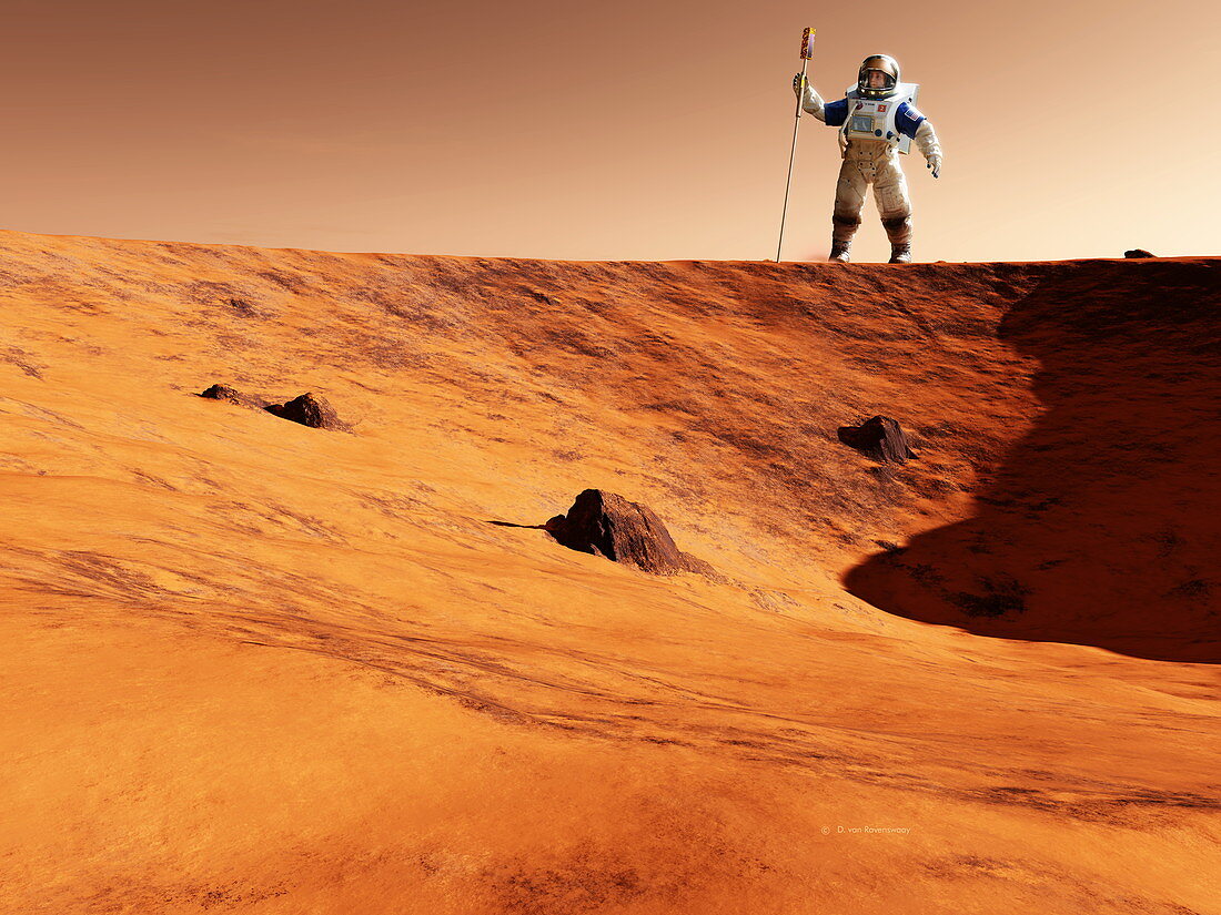 Astronaut on edge of Martian crater