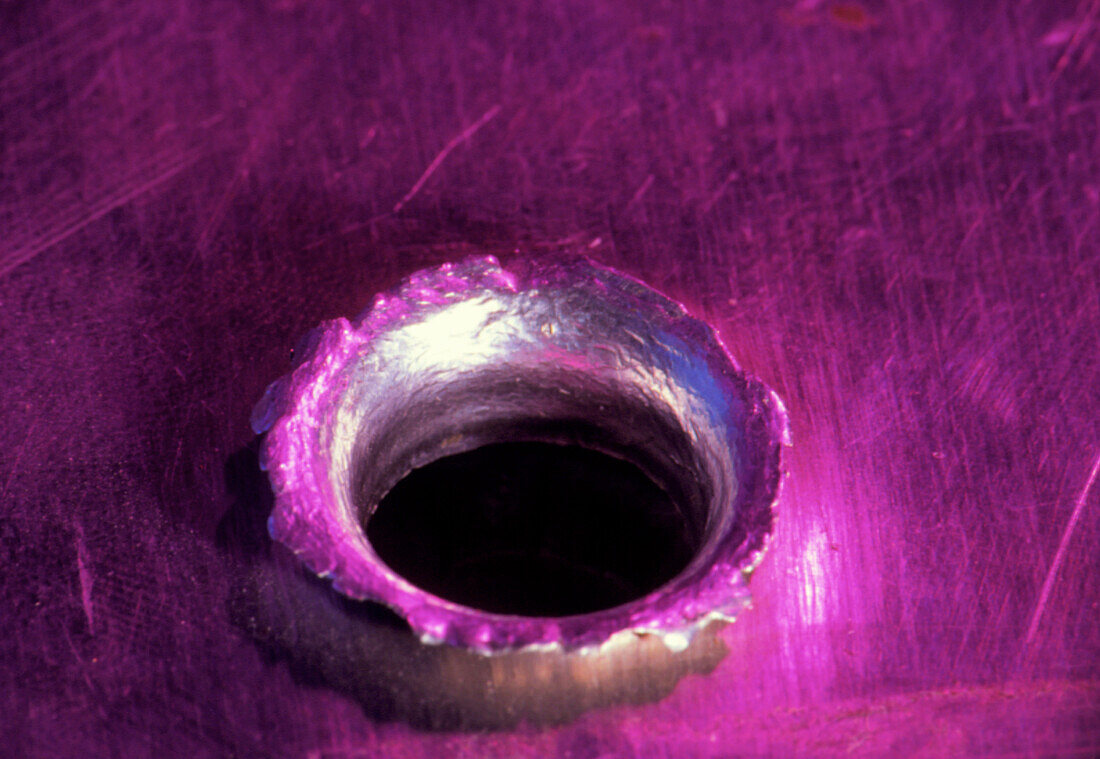 Crater on aluminium sheet from impact research