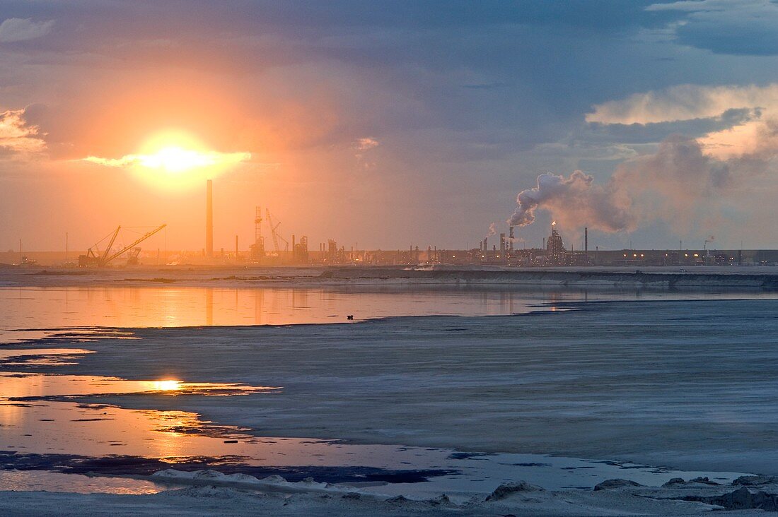 Oil refinery near sunset