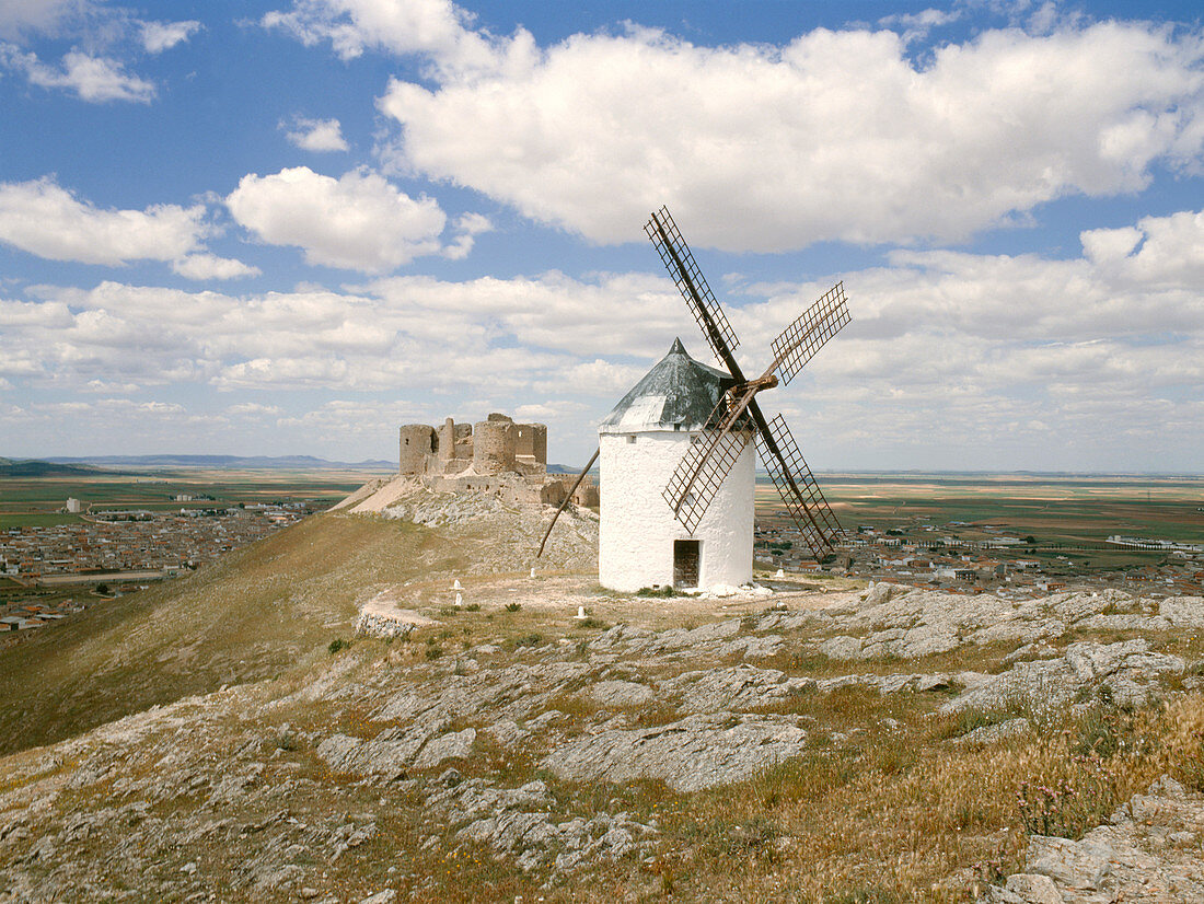 Windmill and castle ruin,Spain