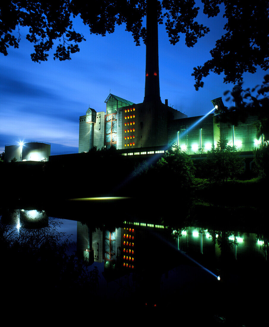 Coal-fired power station reflected in a river