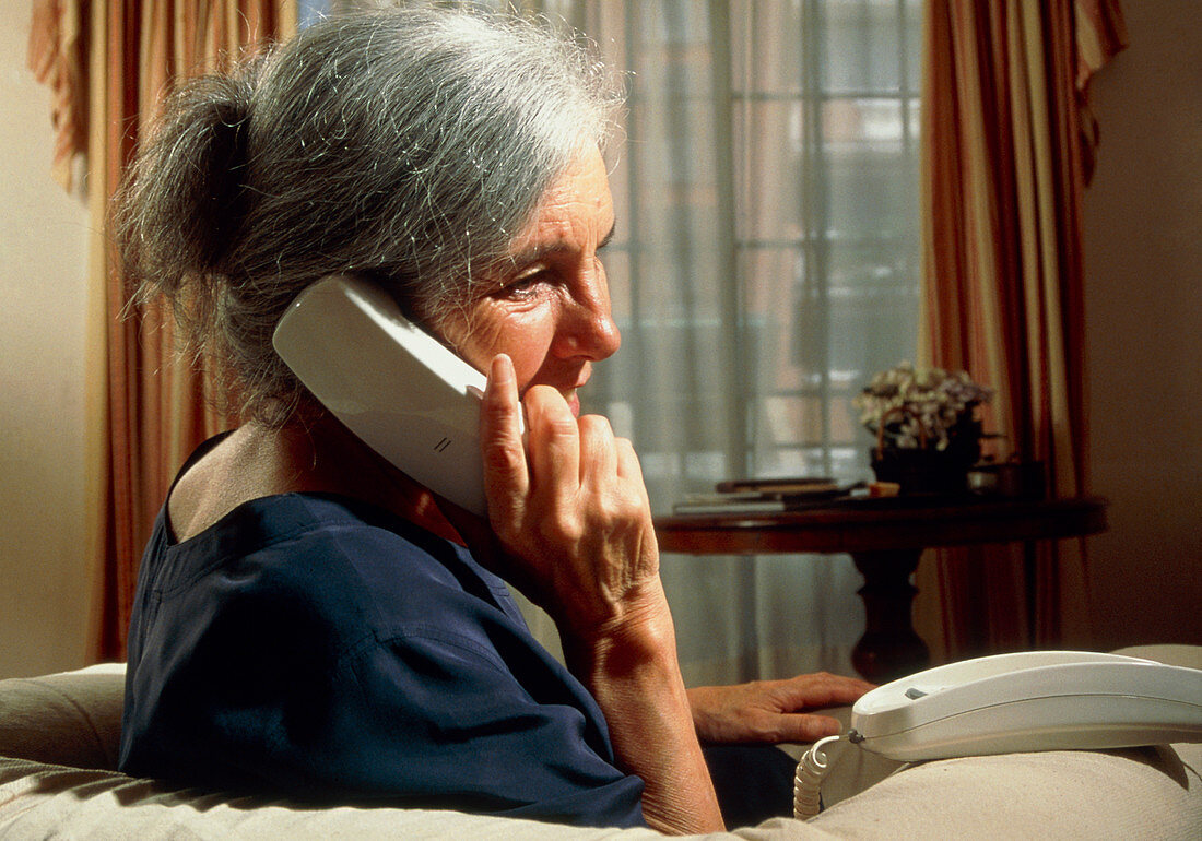 Woman talking on telephone