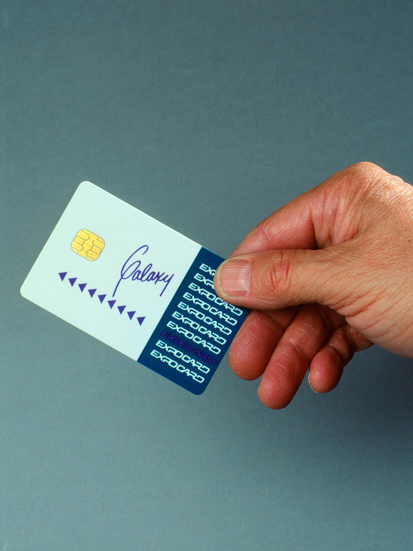 Hand holding a smart card