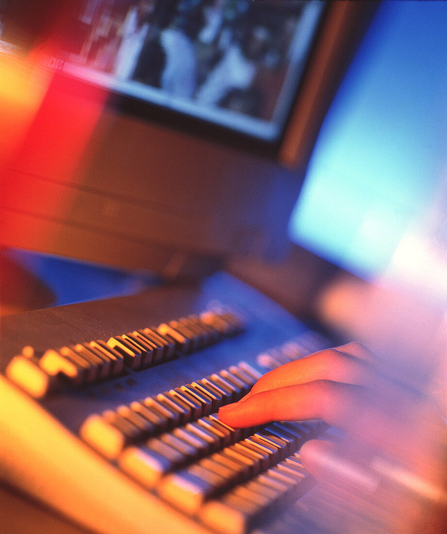 Hand using a computer keyboard