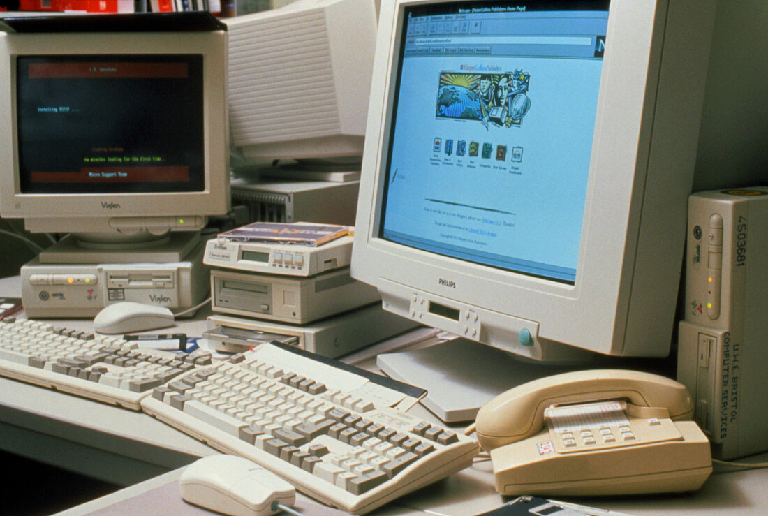 Computers and peripherals on an office desk
