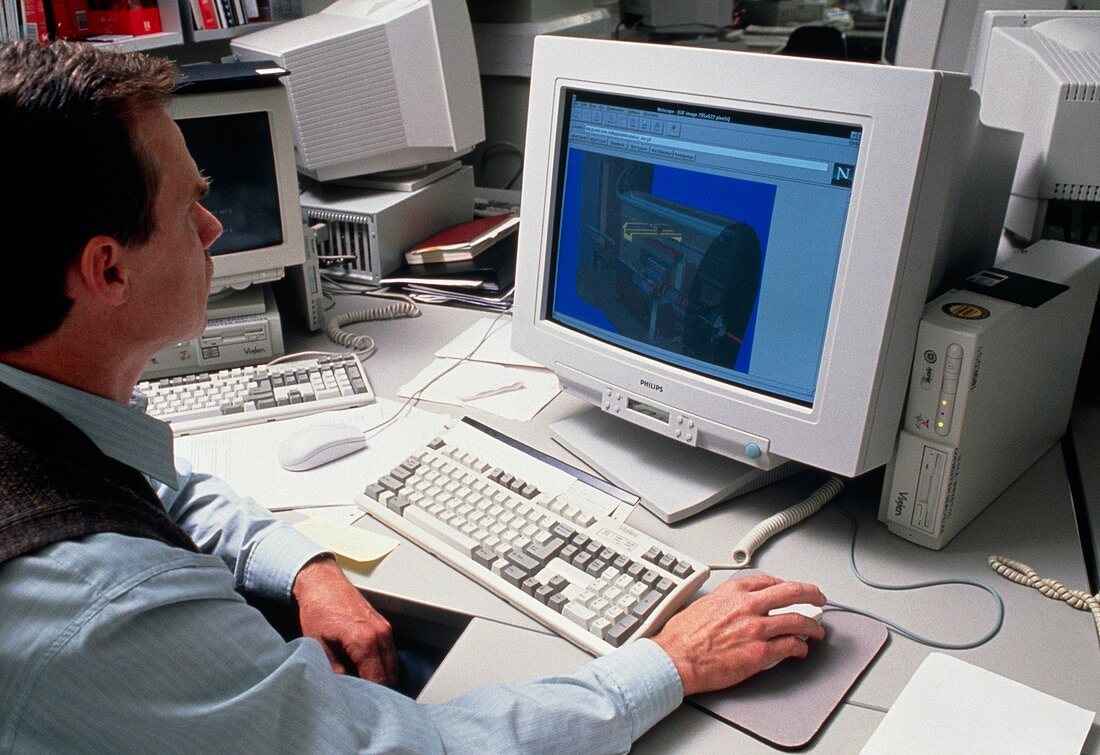 Businessman at a computer accessing the internet