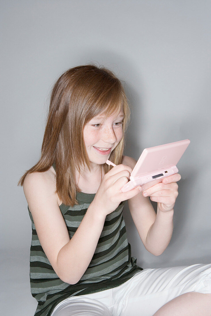 Girl playing on a games console