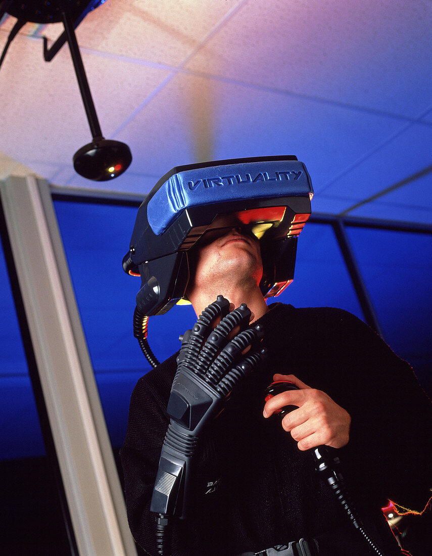 Wearing virtual reality helmet and glove