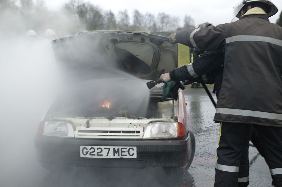 Firefighter extinguishing a fire