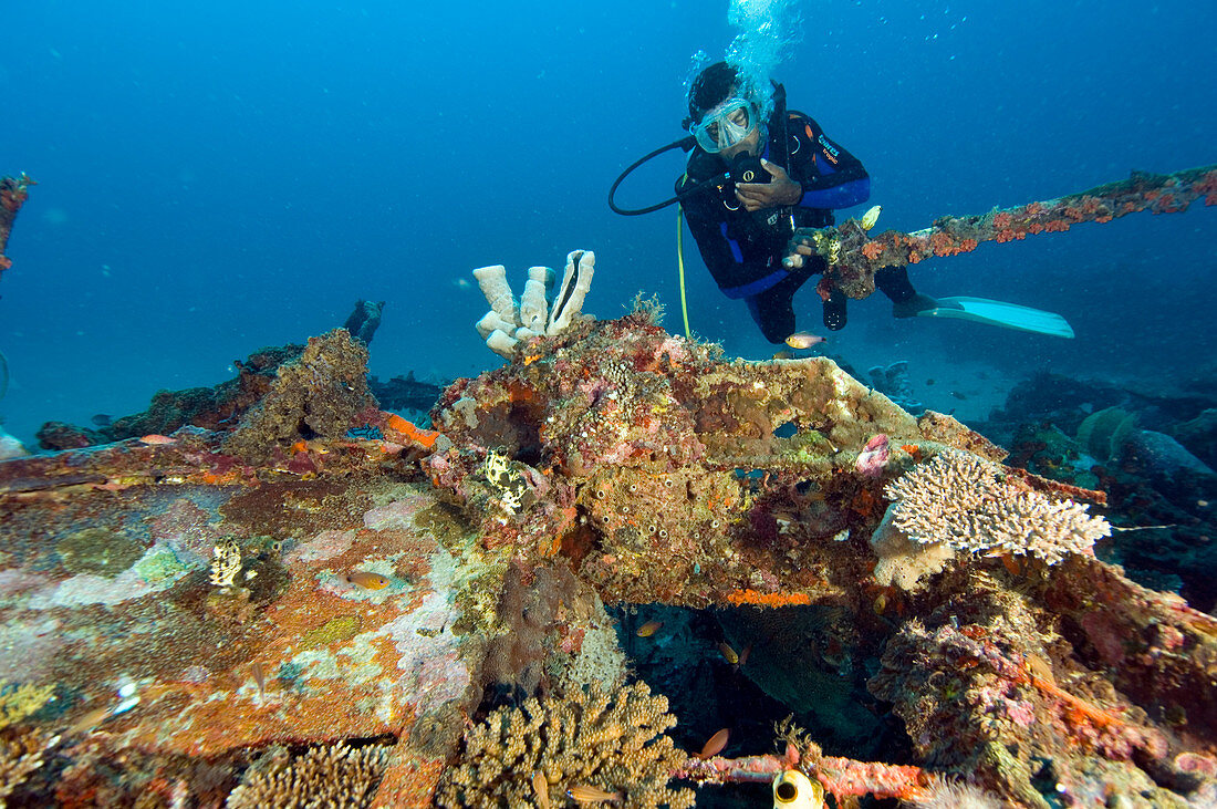 Diver exploring a plane wreck