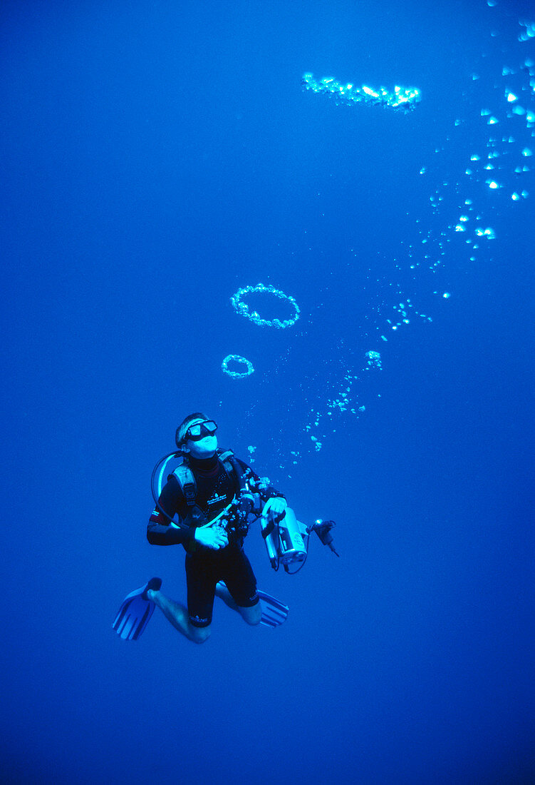 Diver blowing bubbles