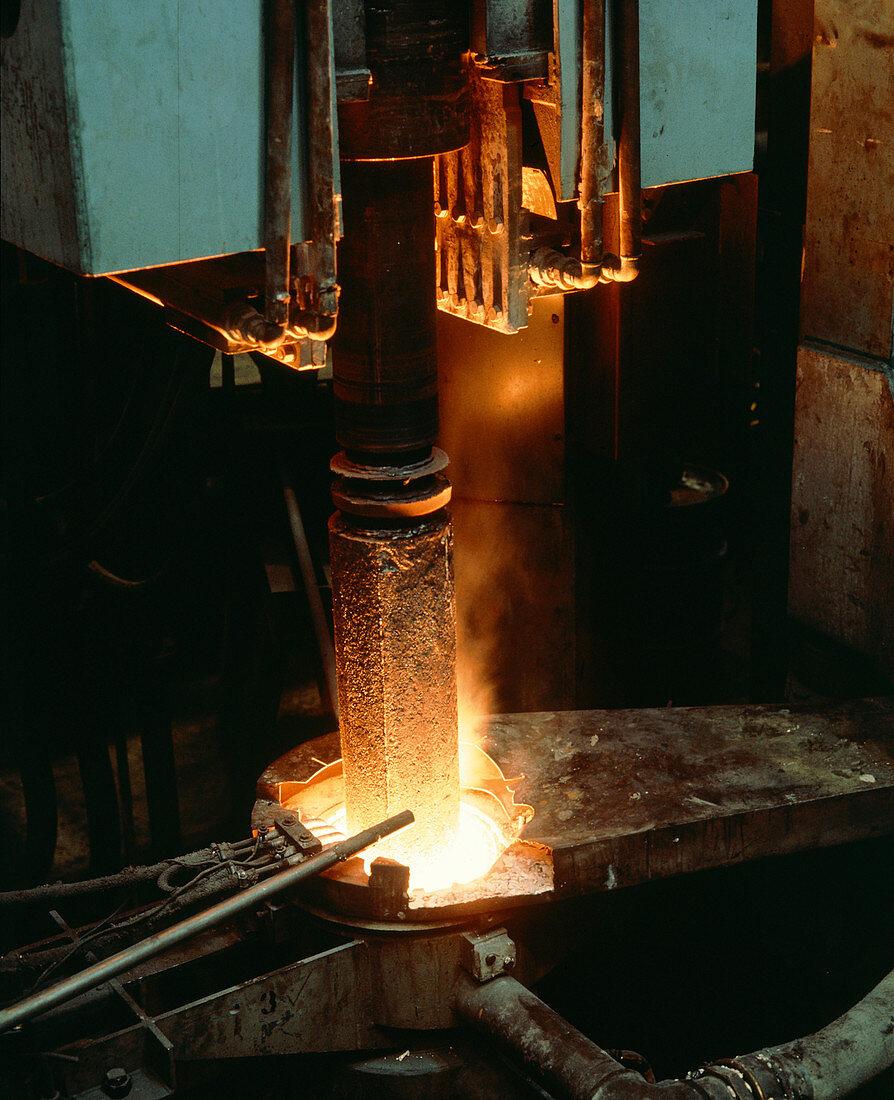 Superalloy charge being drawn from furnace