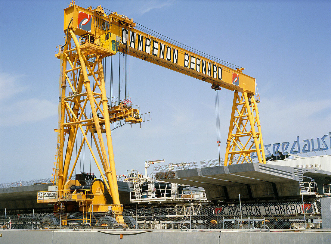 Construction crane lifting motorway