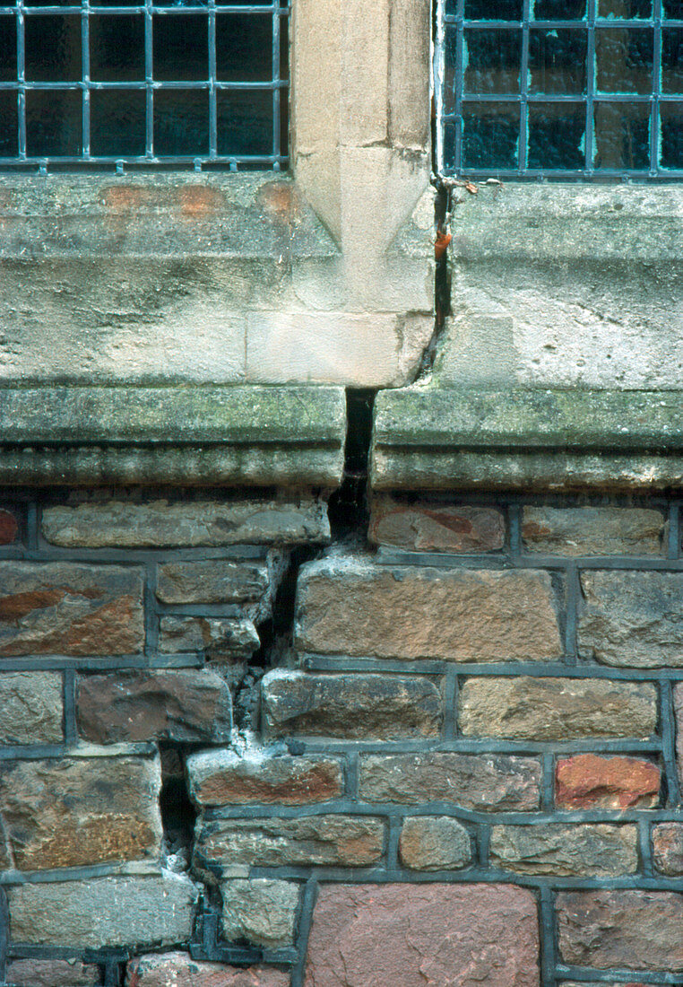 Brick wall and mortar of a church severely cracked