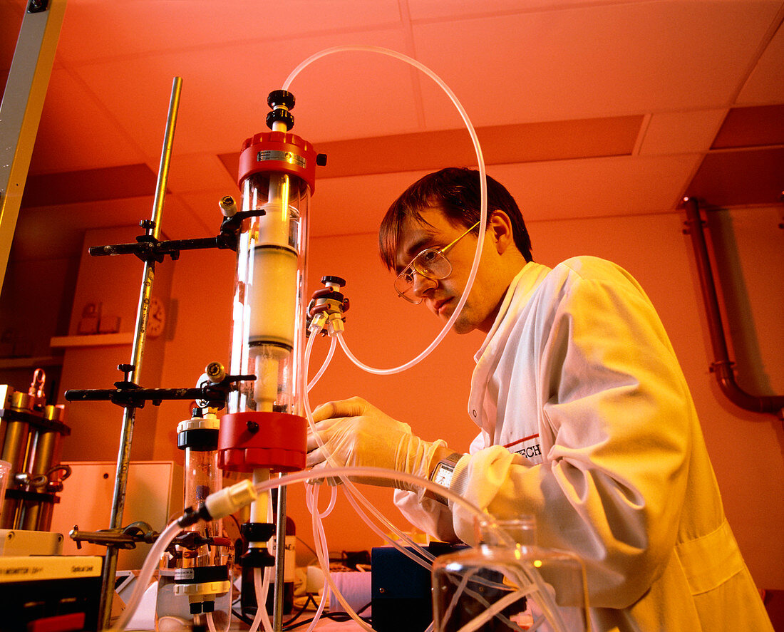 Scientist with chromatography equipment