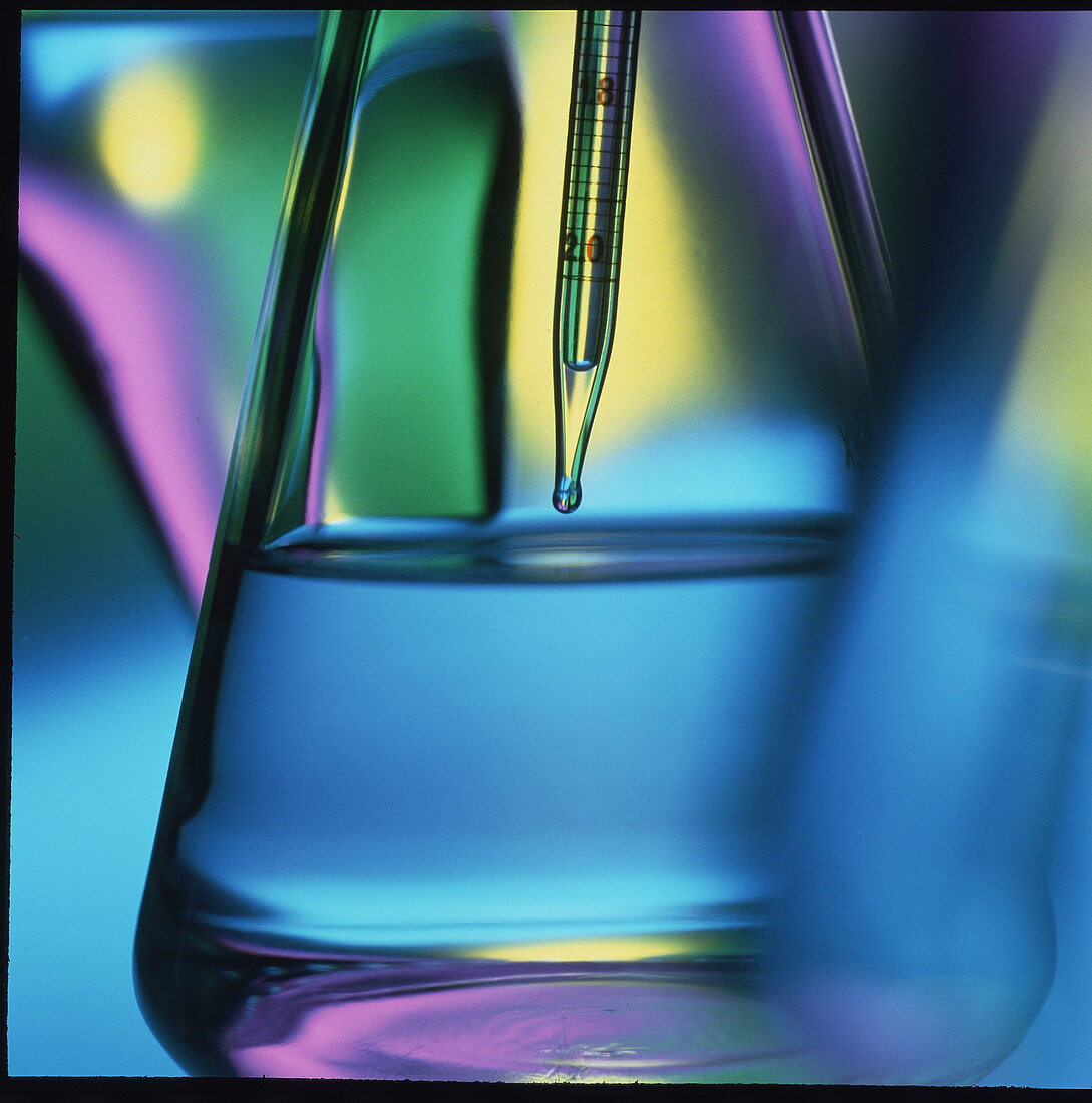 Abstract view of pipette in conical flask