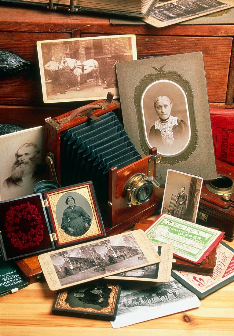 Historical camera with old family portraits