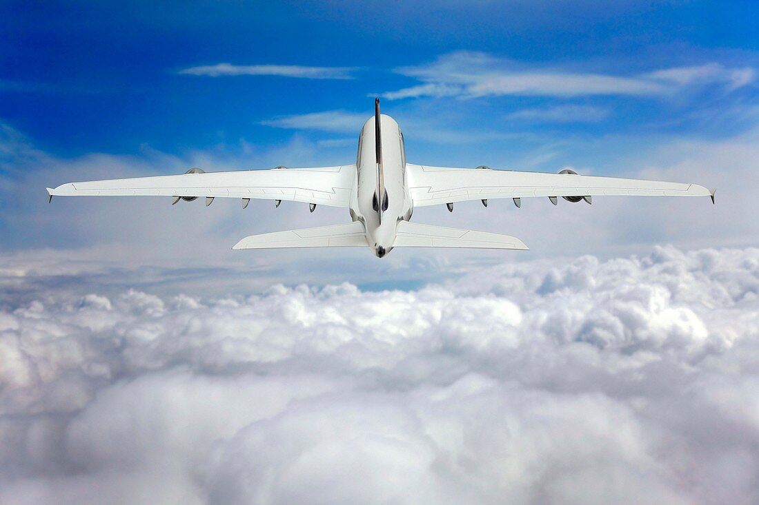 Aeroplane ascending above clouds