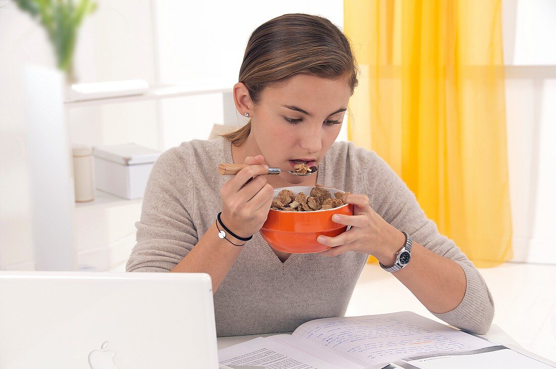 Student eating cereal