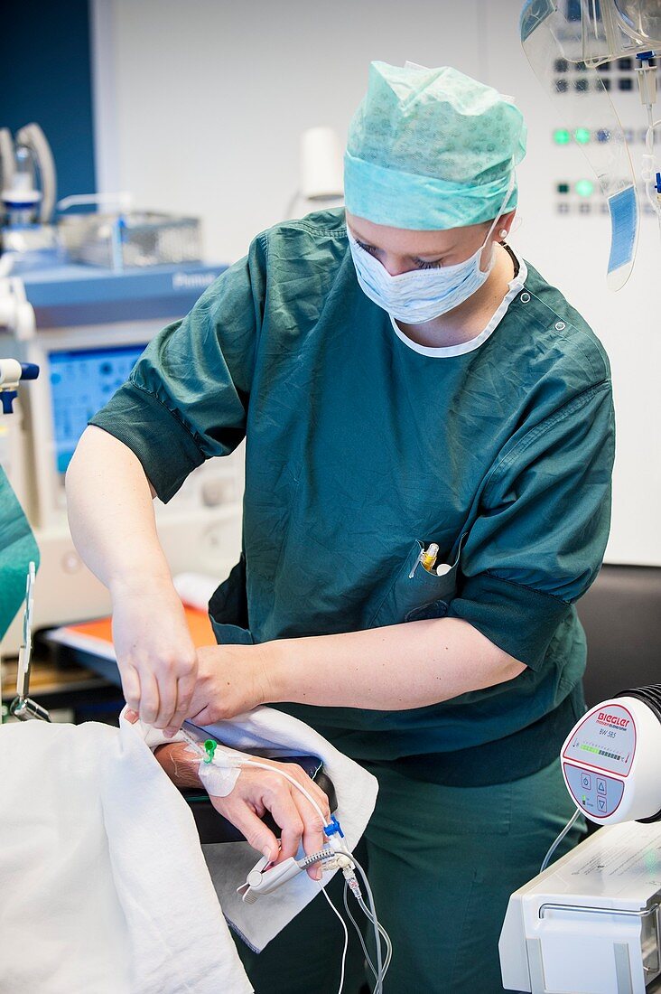 Anaesthetist preparing for surgery