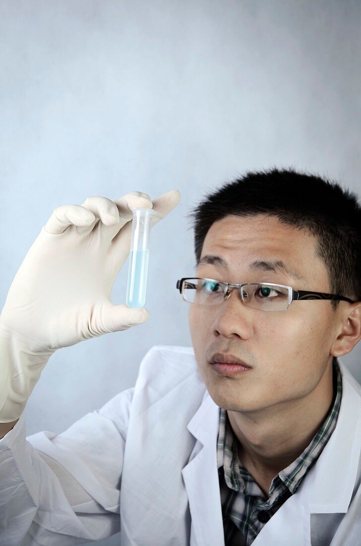 Scientist holding a test tube