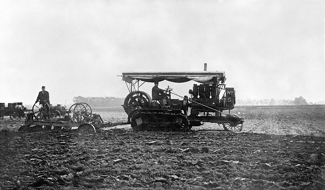 Ploughing with tracked tractor,1912