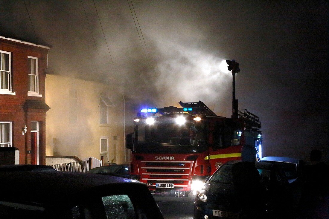 Fire engine attending a house fire