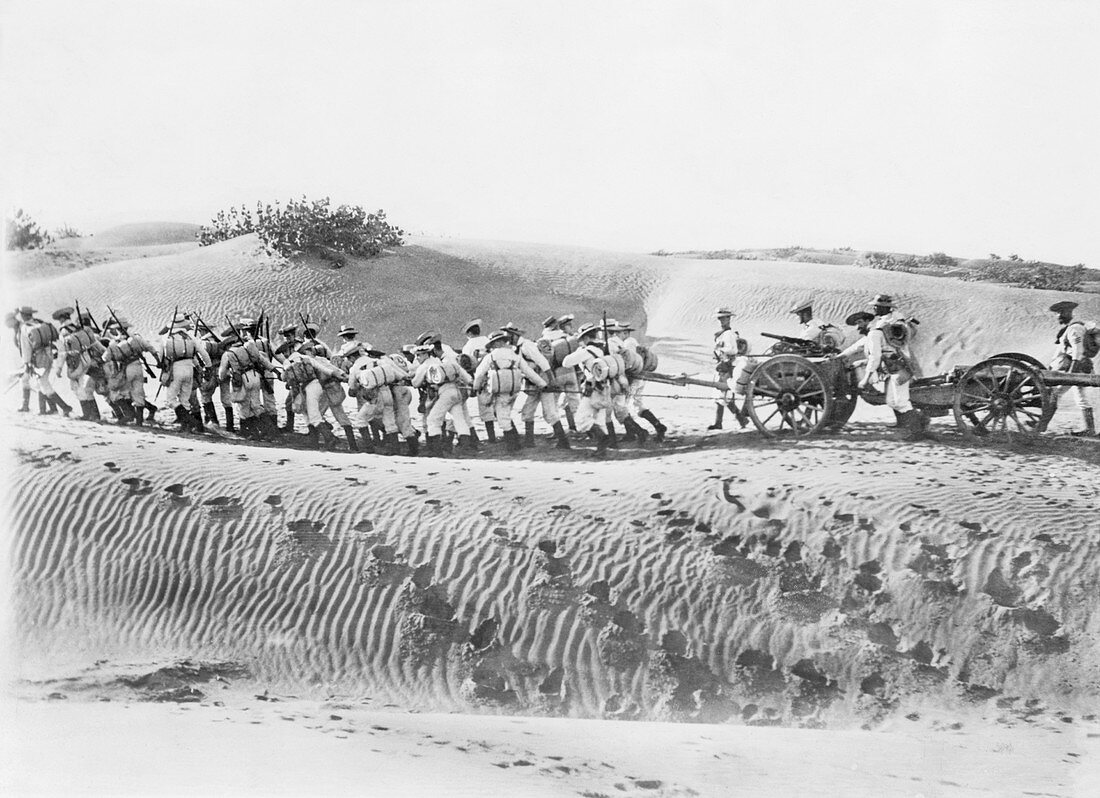Soldiers pulling field guns,World War I