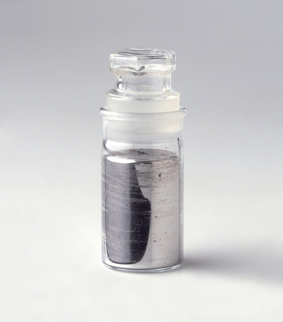 Liquid mercury in glass bottle
