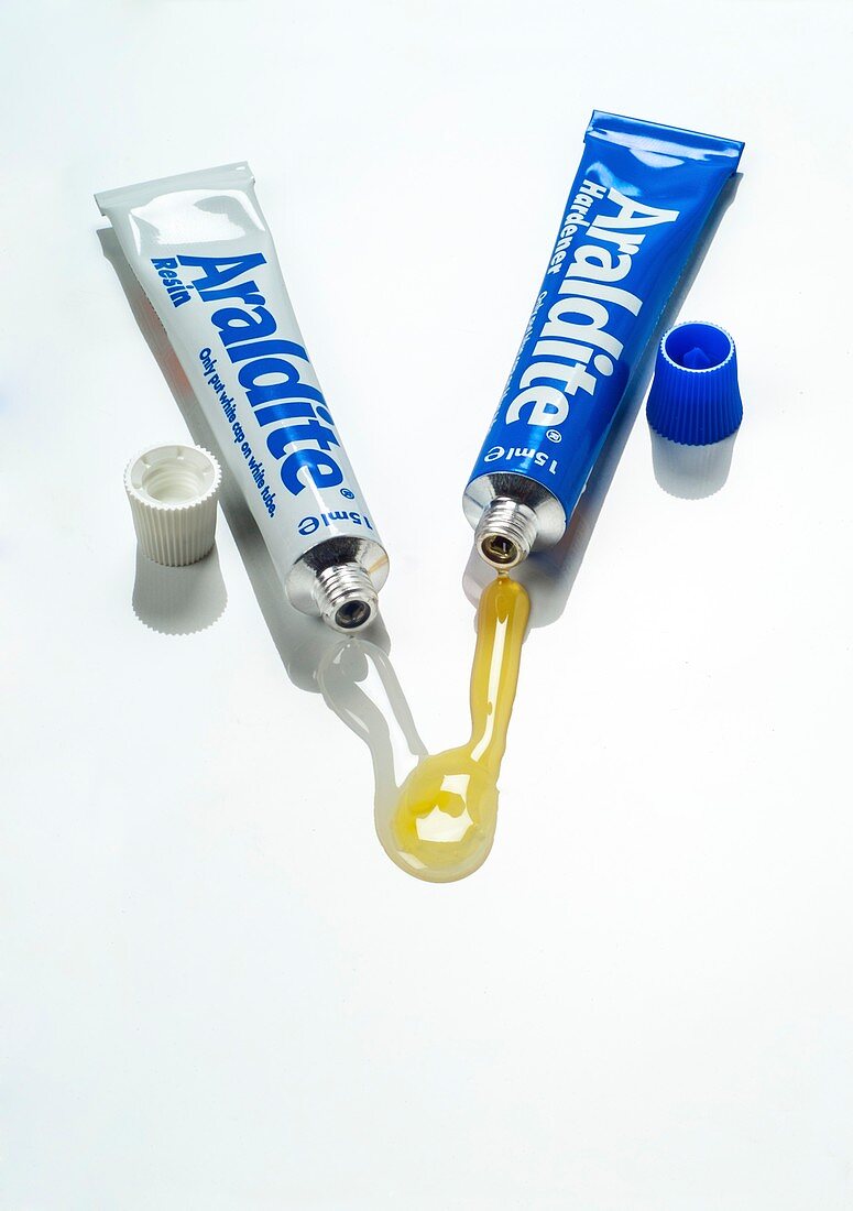 Tubes of synthetic resin adhesive