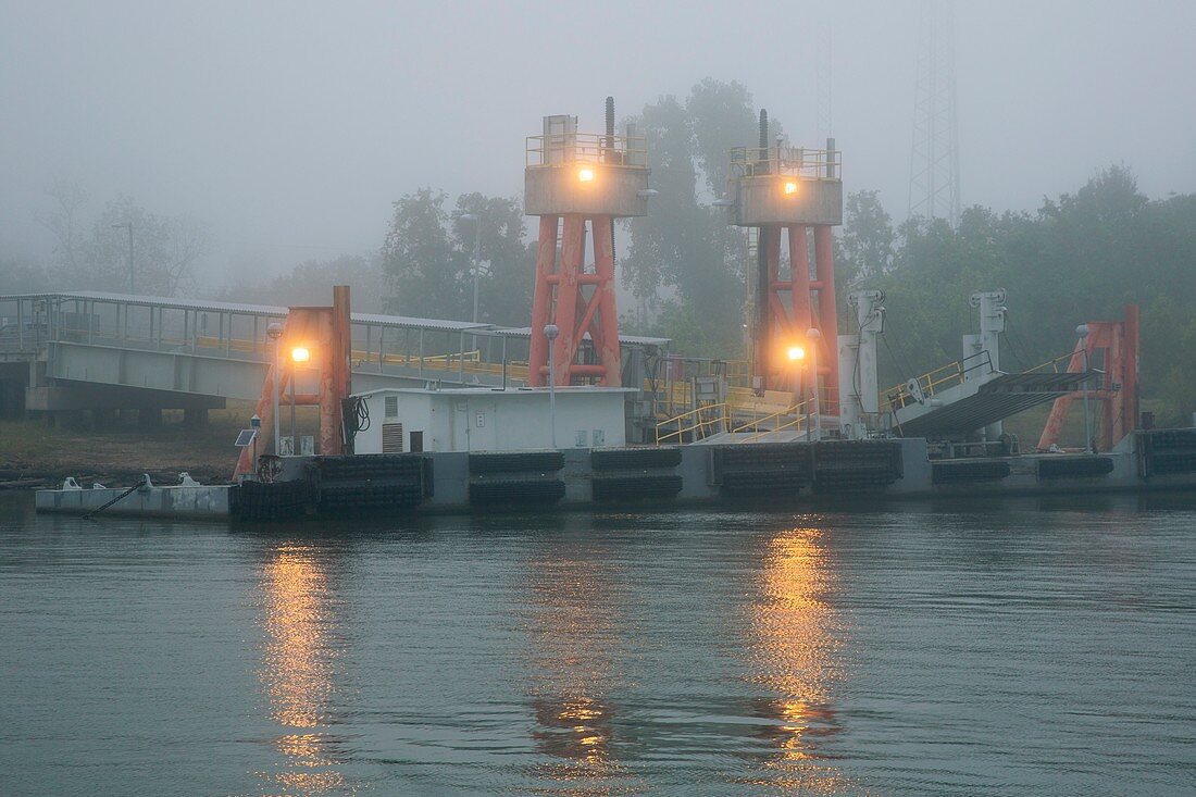 Ferry dock in fog on the Mississippi