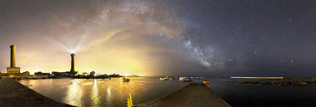 Night sky over a harbour