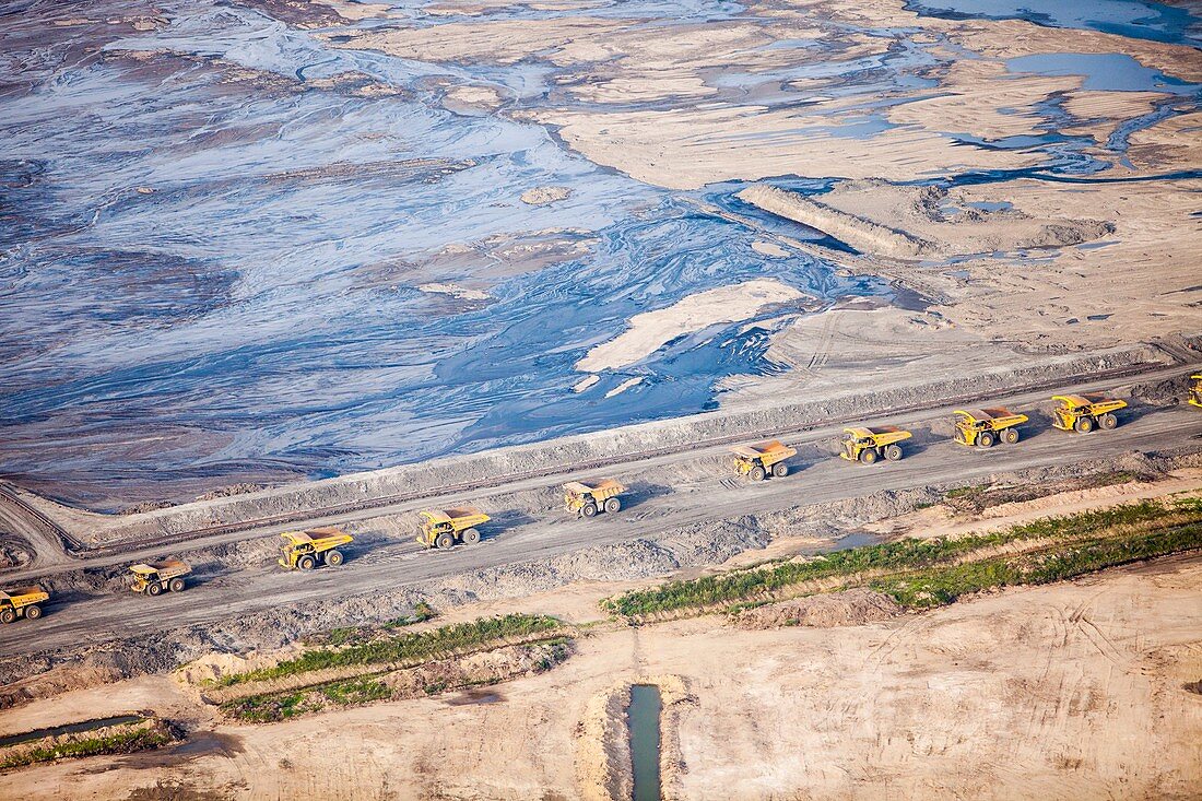 Dump trucks at tar sand mine