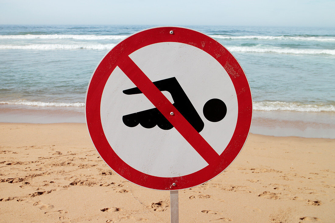 No swimming sign on a beach