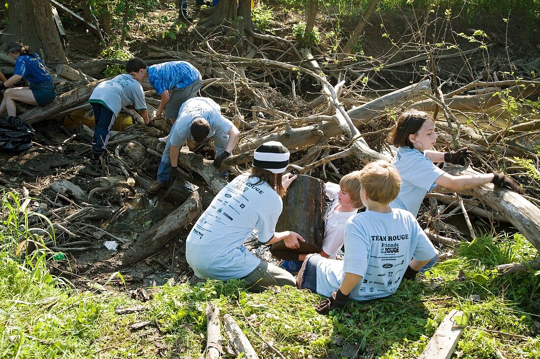 Volunteers clearing logs
