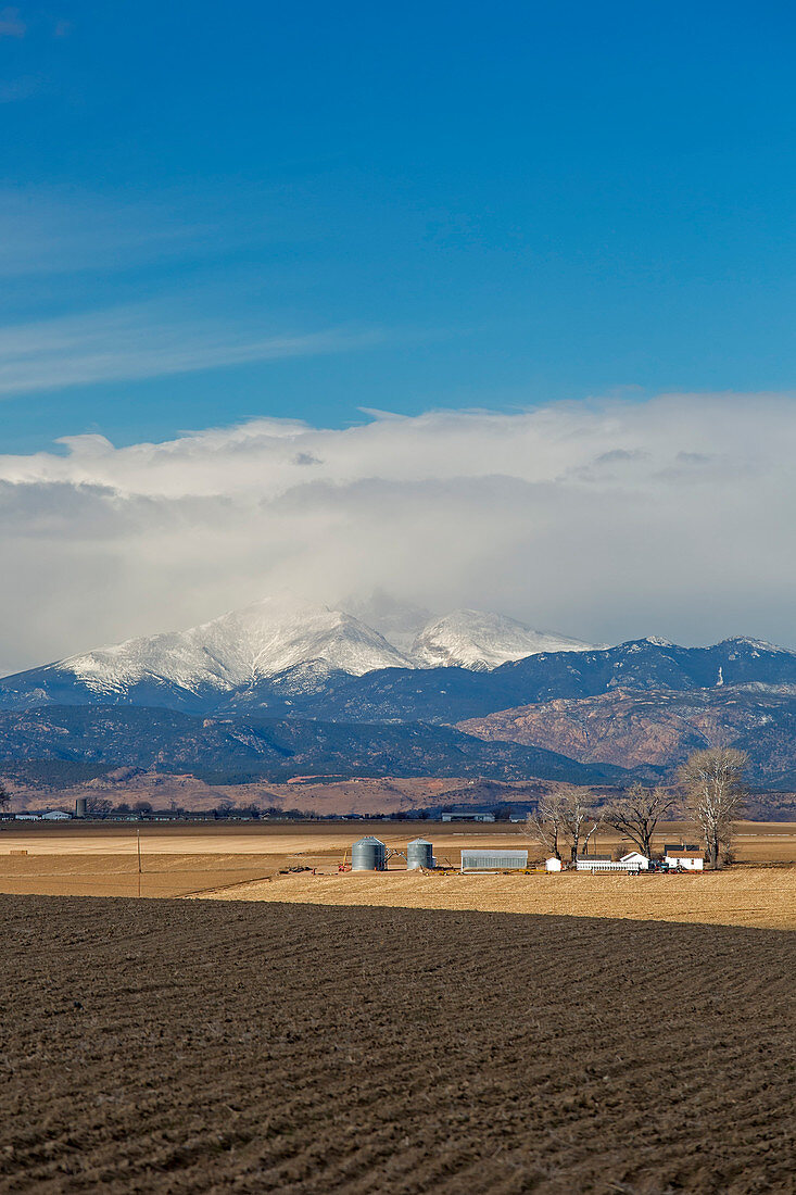 Farmland below the Rocky Mountains,USA