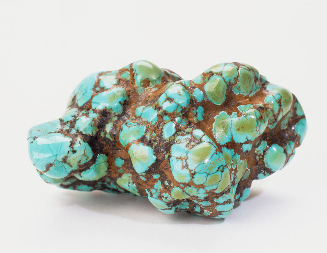 Turquoise embedded in iron oxide