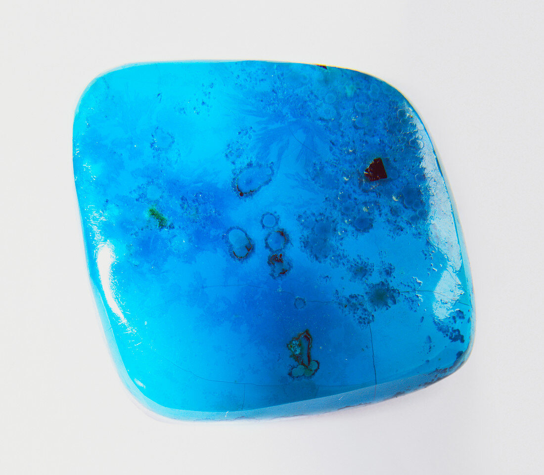 Polished vivid blue chrysocolla pebble