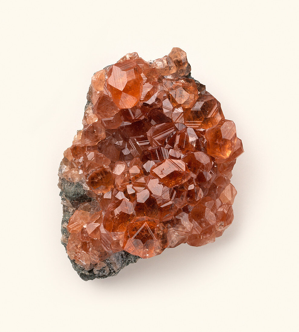 Grossular garnet crystals on rock surface