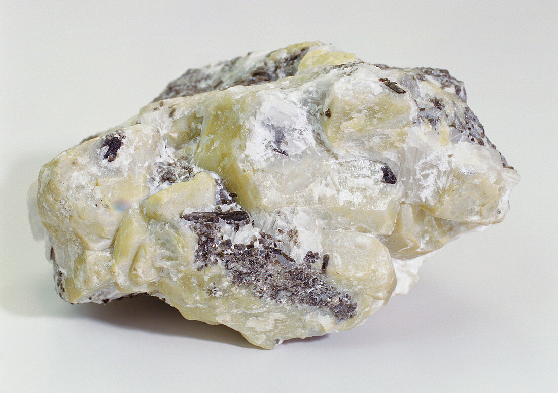 White Meionite crystal in rock groundmass
