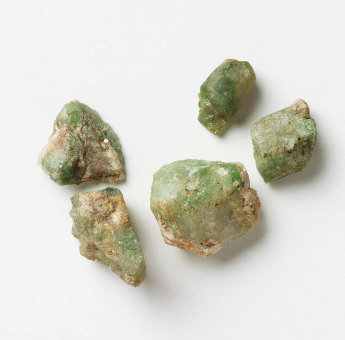 Five unpolished emerald rocks,close up