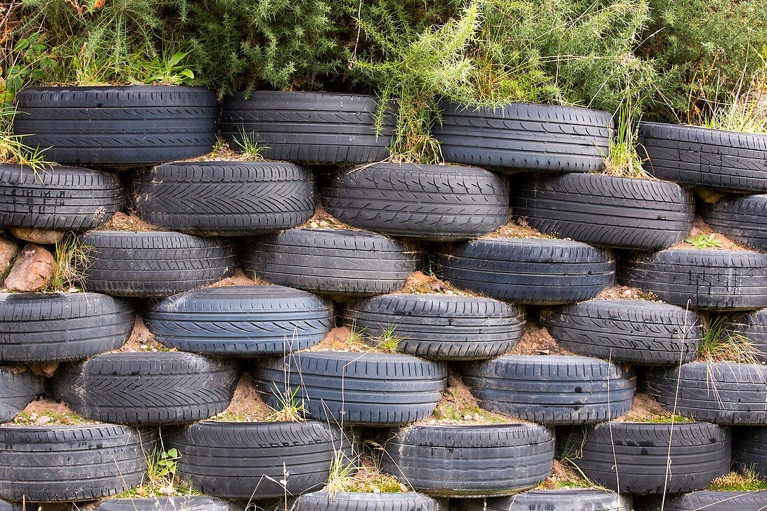 A recycled tyre wall in Scoraig