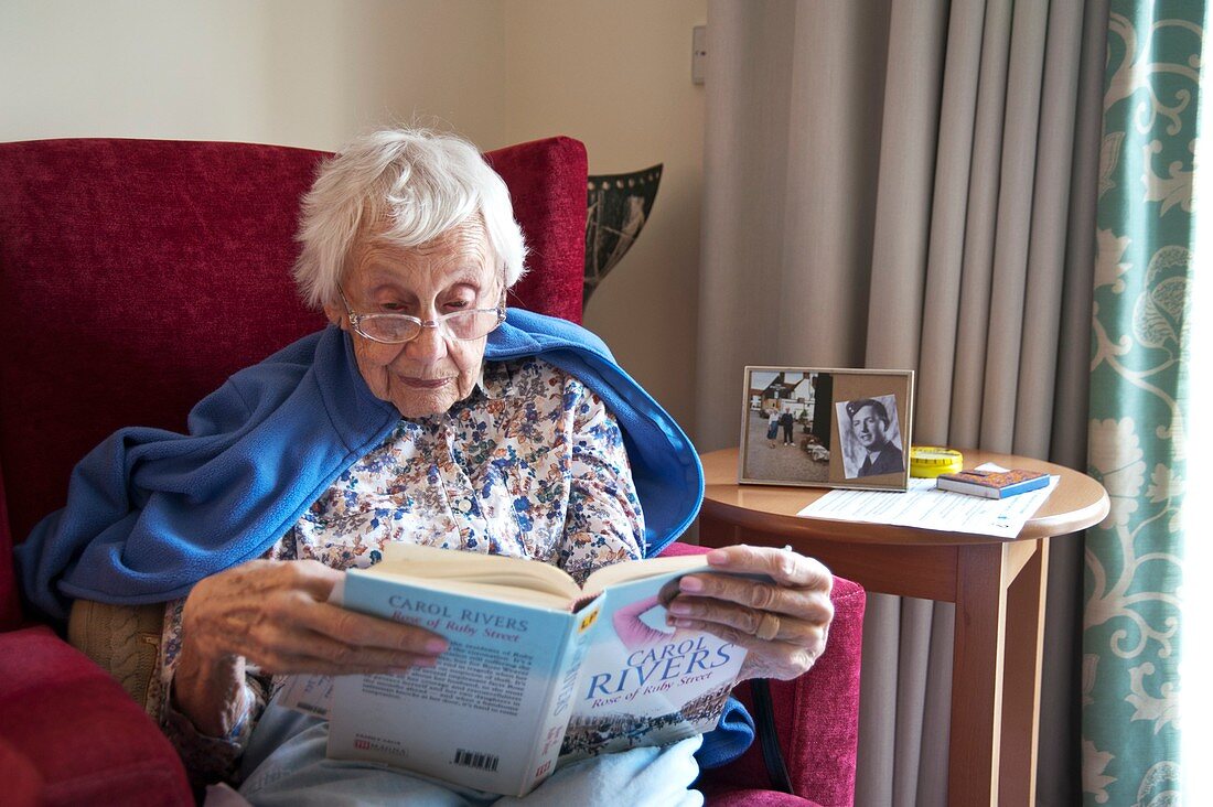 Elderly woman reading