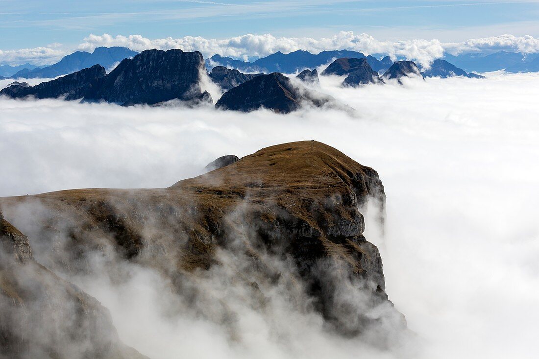 Peaks surrounded by sea of fog