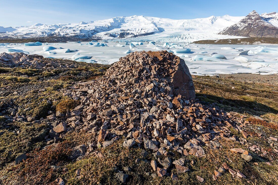 Weathered erratic and glacial lake
