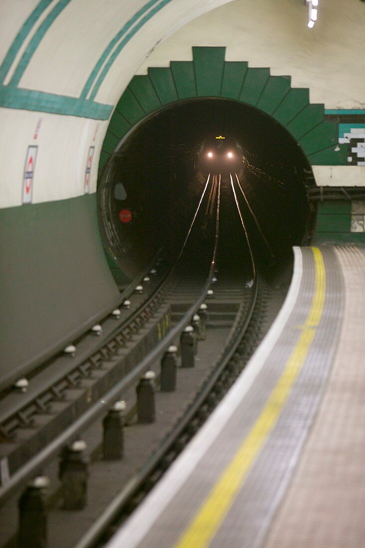 Underground train coming out of a tunnel