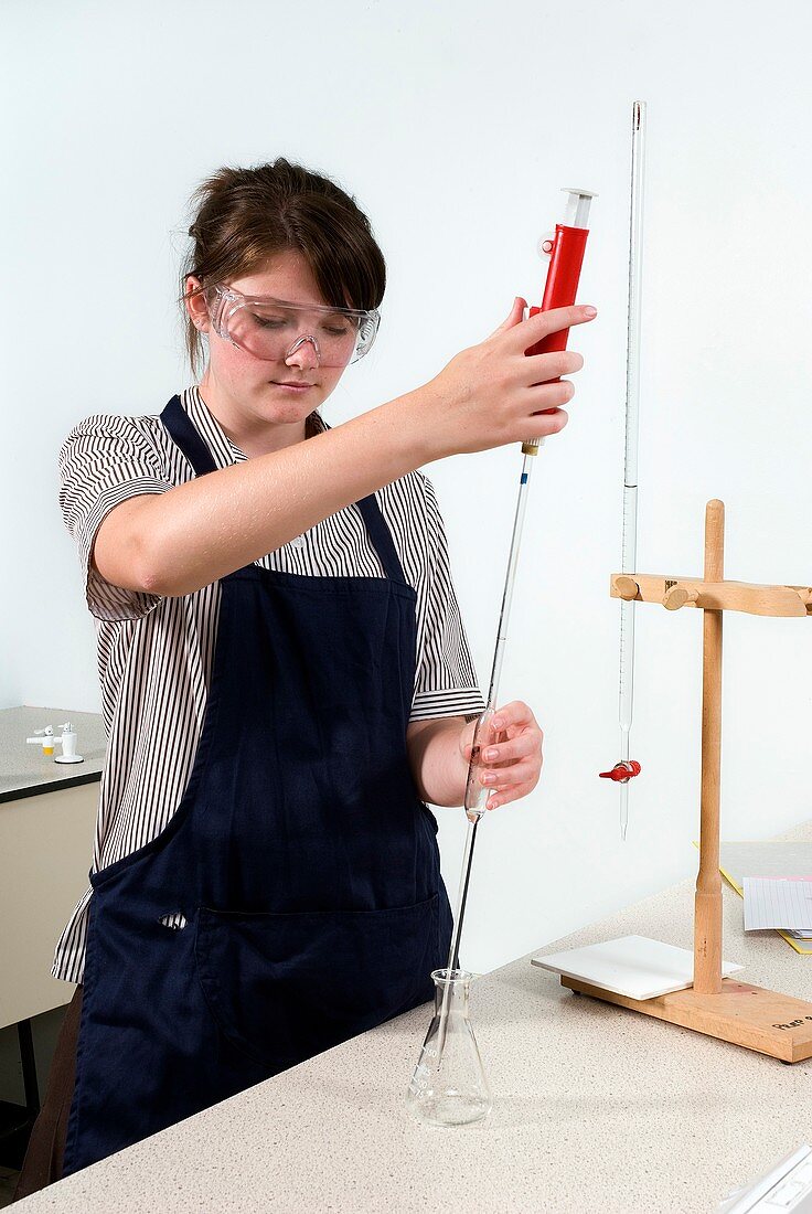 Student using pipette