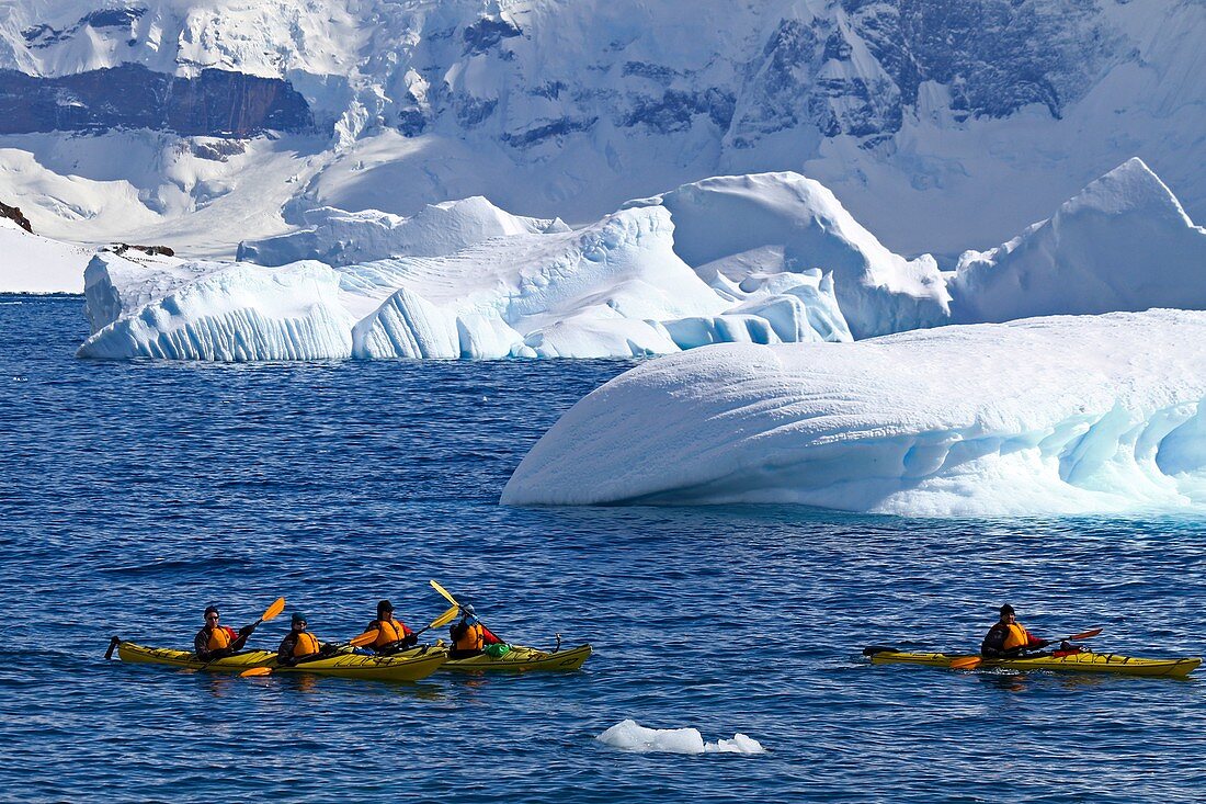 Kayaks near icebergs,Antarctica